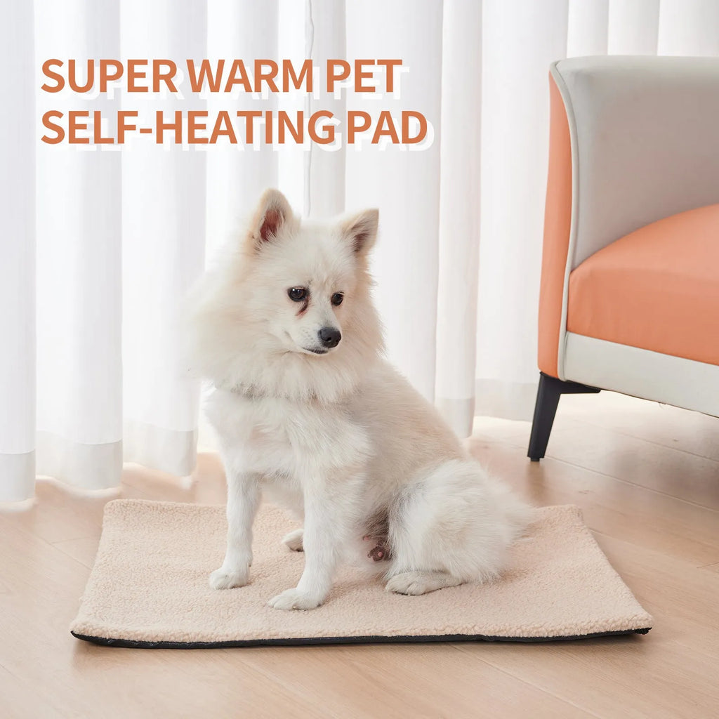 Grey plush self-heating pet pad for cats and dogs on indoor floor
