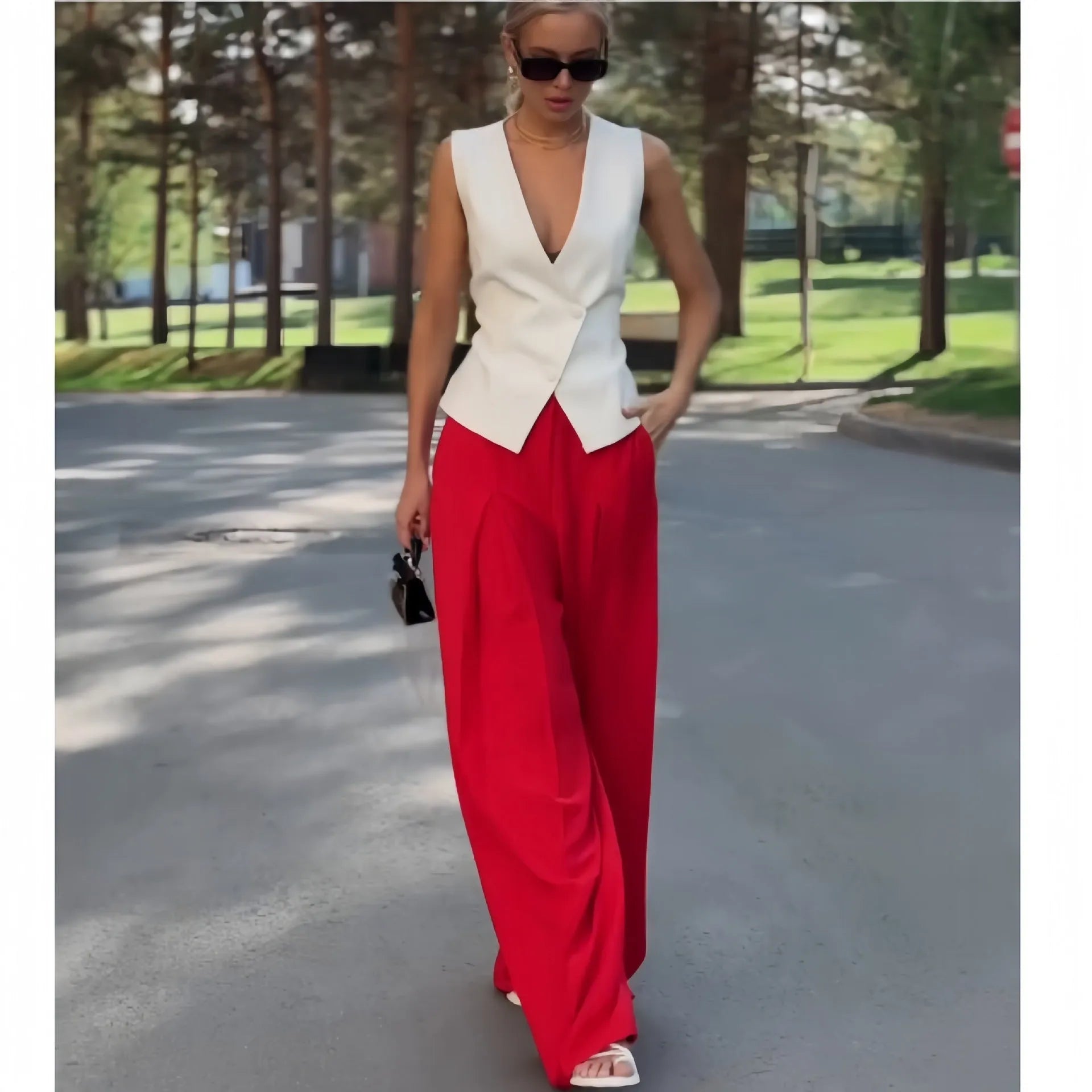 Women's deep V-neck sleeveless top and high waist wide leg pants two-piece set in beige polyester