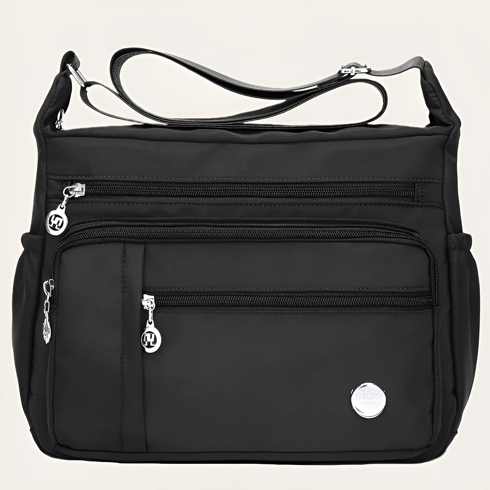 Lightweight nylon women's one shoulder crossbody bag in black with horizontal square shape and visible sewing thread detail