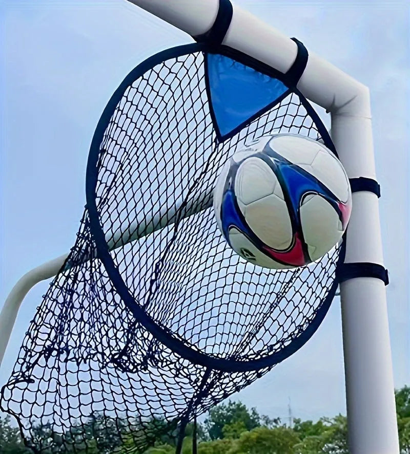Black portable soccer training goal net with fibreglass poles set up on grass for practice.