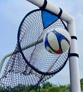 Black portable soccer training goal net with fibreglass poles set up on grass for practice.