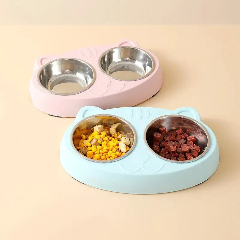Blue double compartment plastic pet feeder tray for cat or dog food and water.