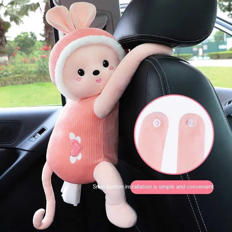 Plush car seat back tissue box holder with cute animal design mounted on car headrest