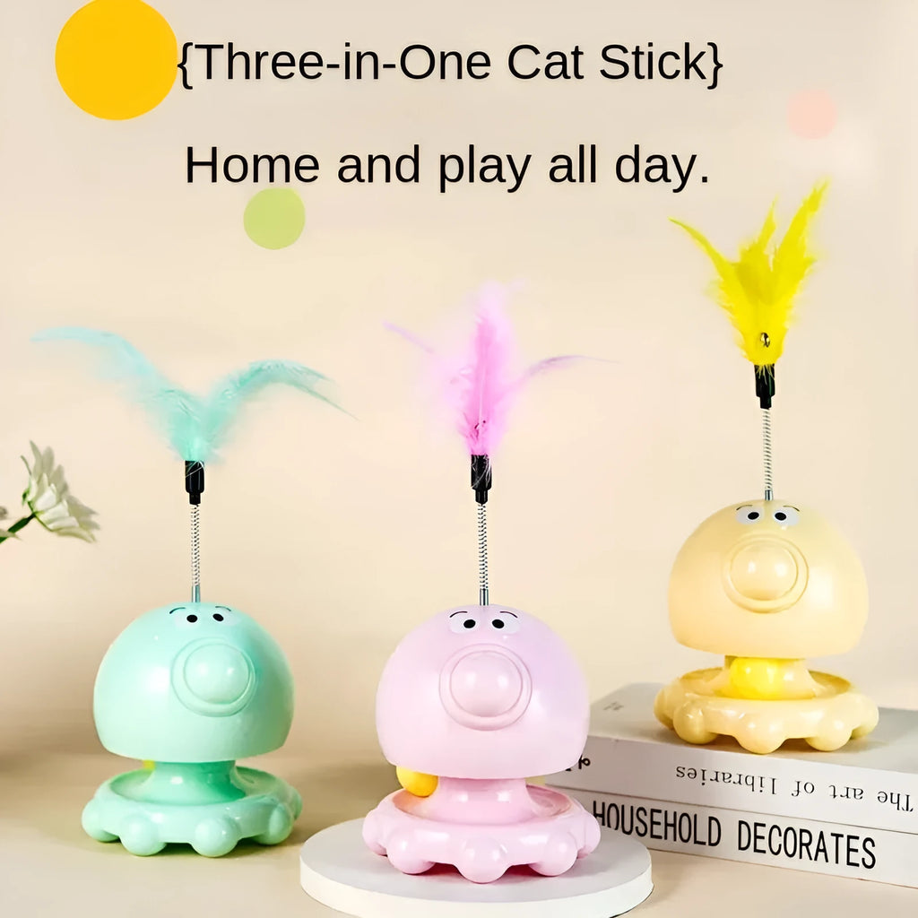 Cat food dispensing turntable toy in green with stick, plastic construction, for indoor cats