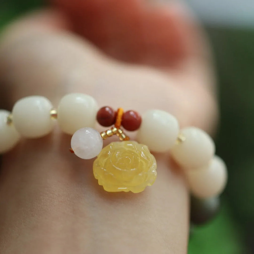 White jade gradient bodhi root bracelet with 10mm floral beads and beeswax lotus decorations