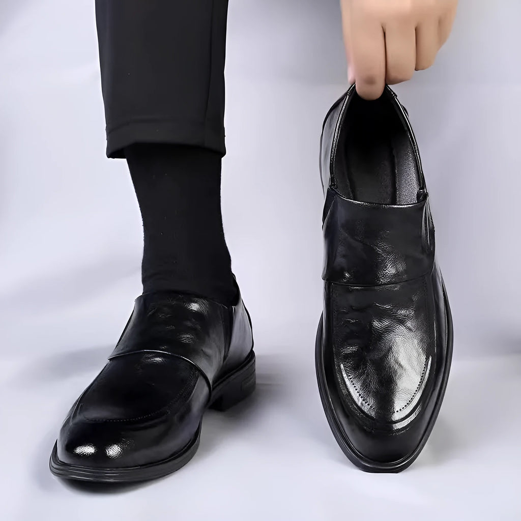 Slip-on cowhide leather men's shoe in black with rubber sole, side view, sizes 38-44