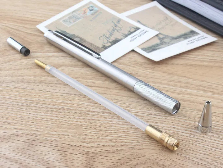 Metal automatic mechanical pencil showing six compatible lead sizes from 0.3mm to 2.0mm