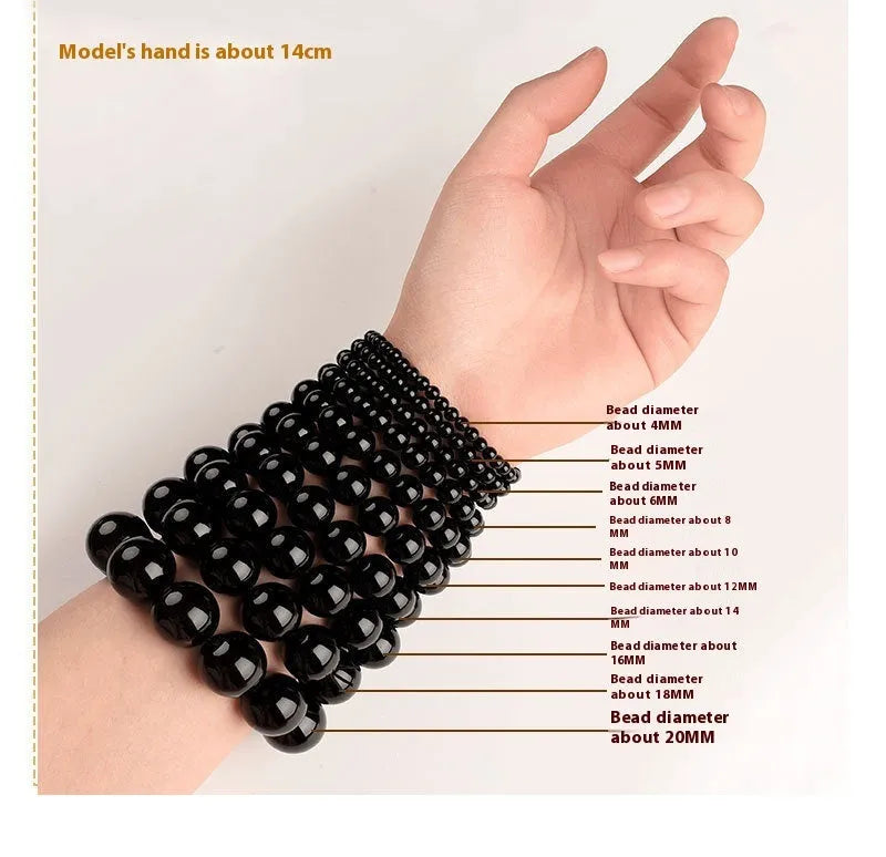 Natural Smokey Violet Hetian jade straight cut bracelet with geometric beads on a wrist.