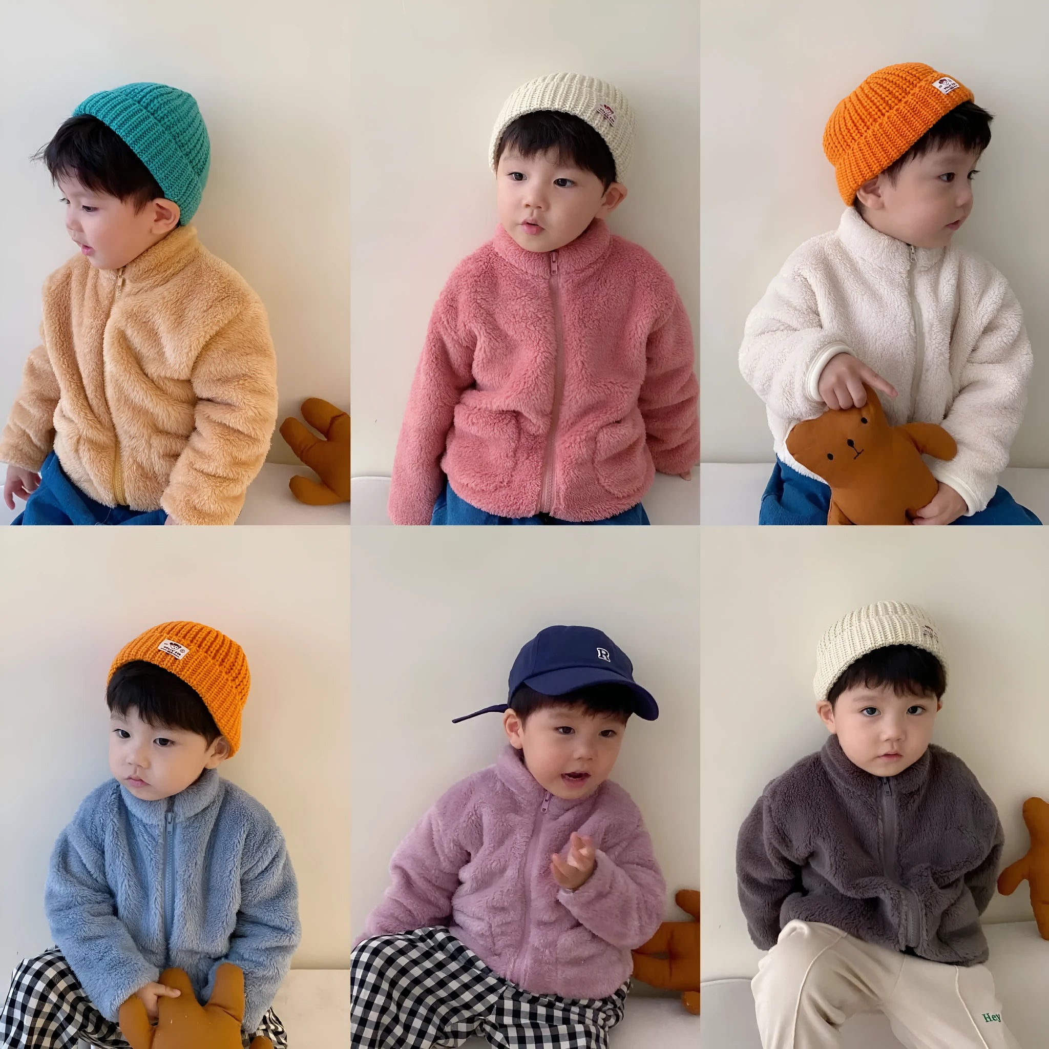 Blue children's sherpa fleece jacket with full zip, high collar, and front pockets.