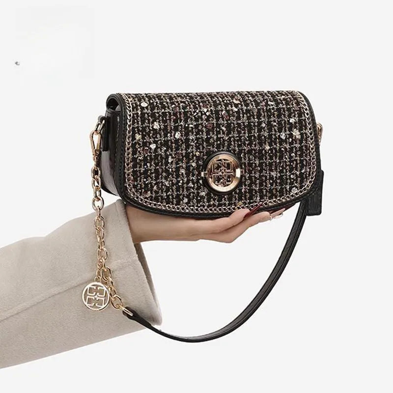Black polyester crossbody shoulder bag with chain strap for commuter leisure travel
