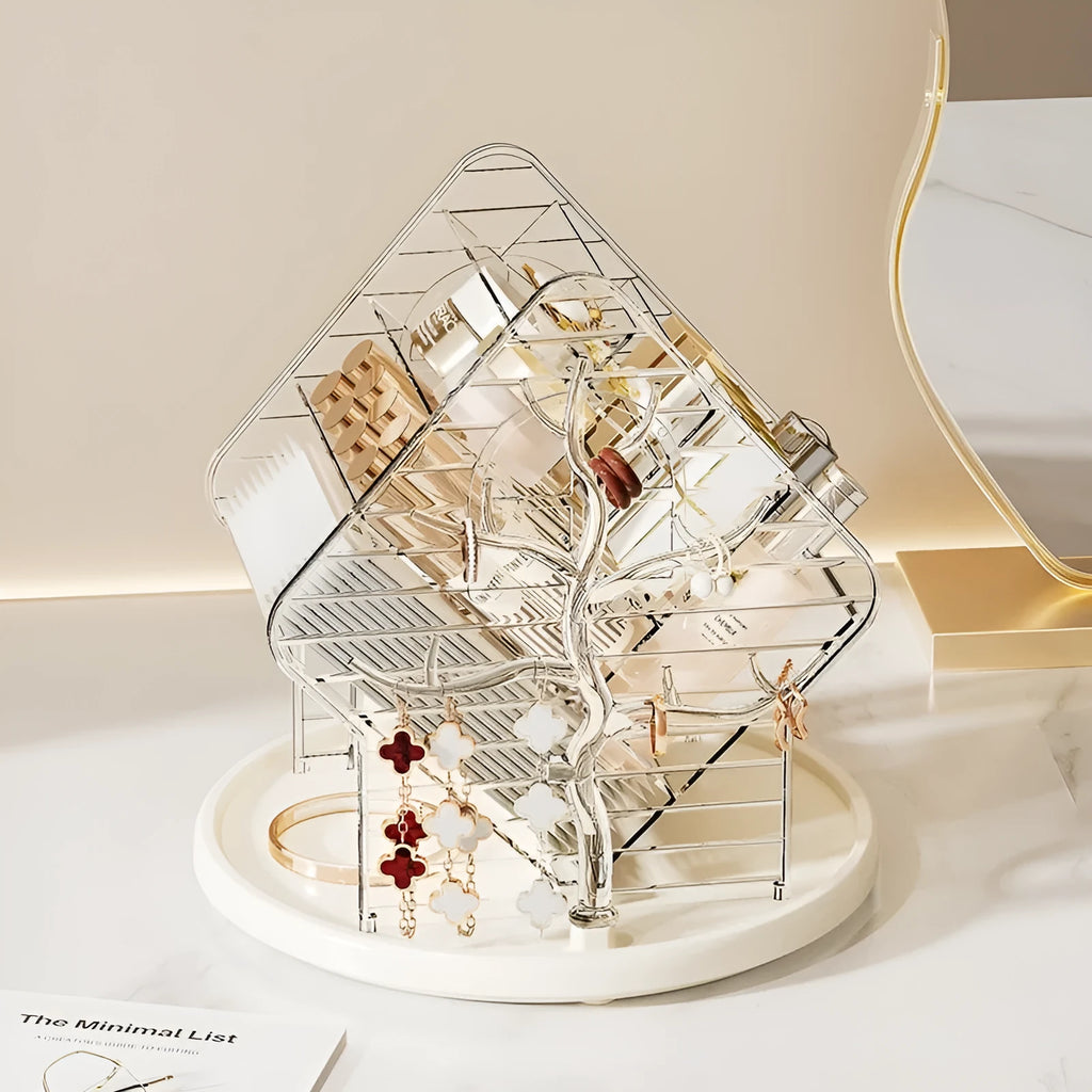 Clear plastic rotating makeup storage box organiser with 360-degree spin base on a dressing table.