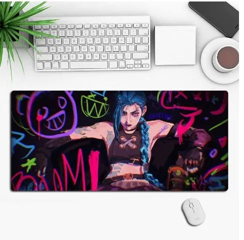 Anime style gaming mouse pad desk mat with non-slip rubber base on a desk.