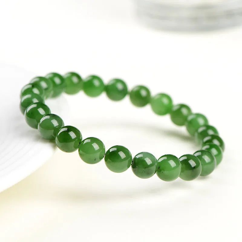 Natural Hetian jade beaded bracelet with polished jasper stones in five size options on a white background.