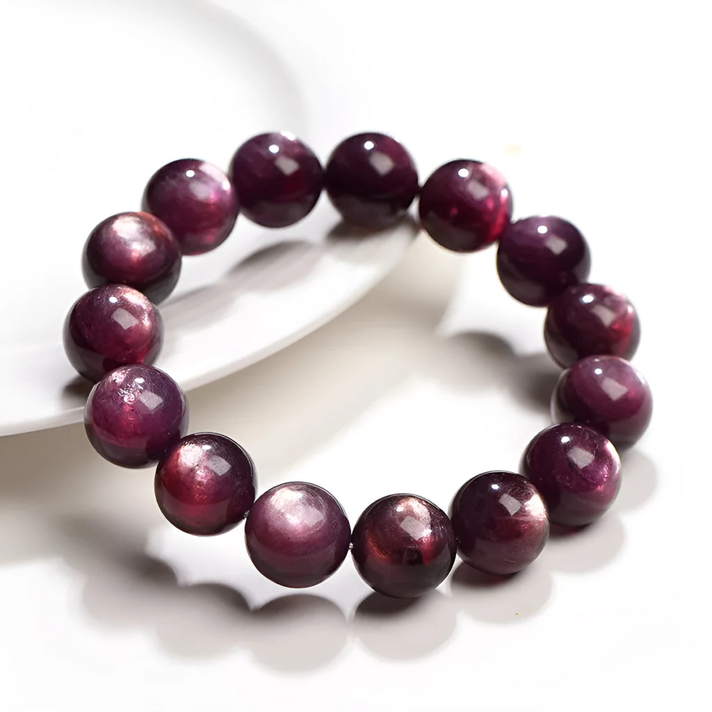 Purple lepidolite crystal bracelet with round polished beads showing selectable size options.