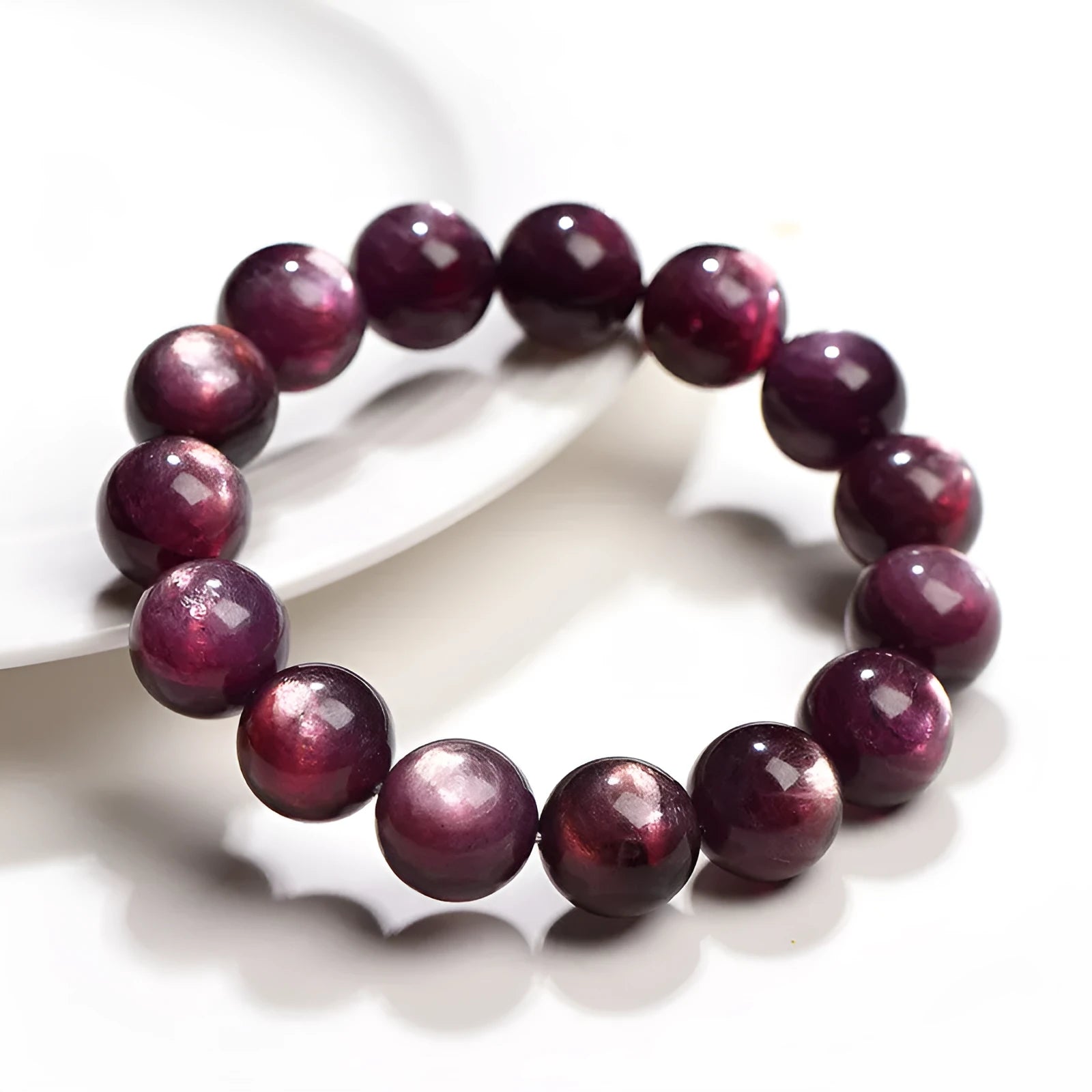 Purple lepidolite crystal bracelet with round polished beads showing selectable size options.
