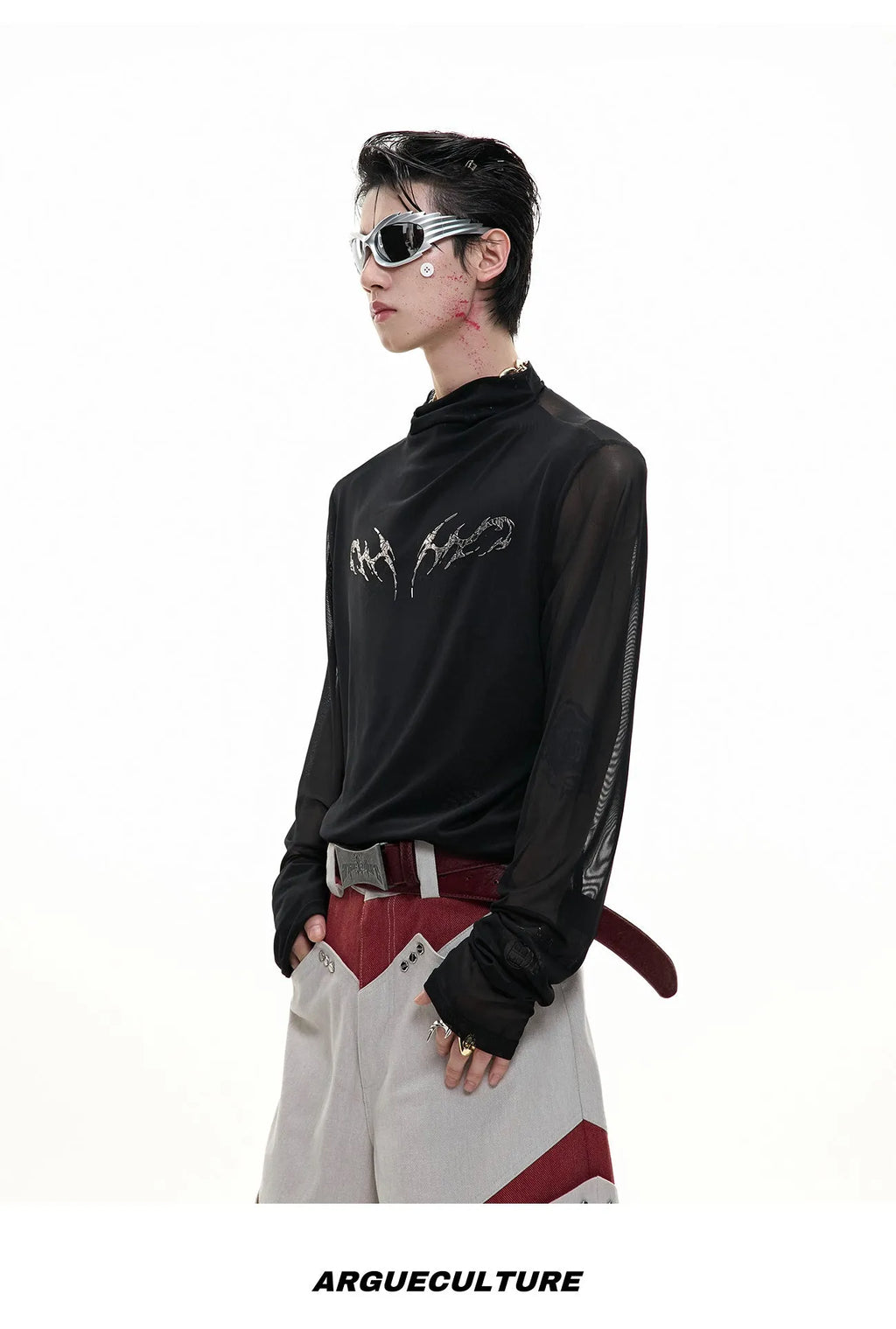 Black mesh slim-fit long sleeve bottoming shirt on a hanger, showing its lightweight texture and close cut.