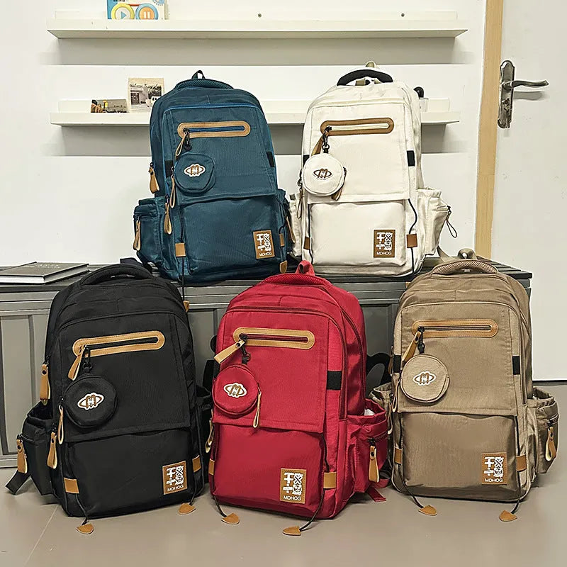Waterproof nylon leisure travel backpack in multiple colours with 20-35L capacity and contrast stitching