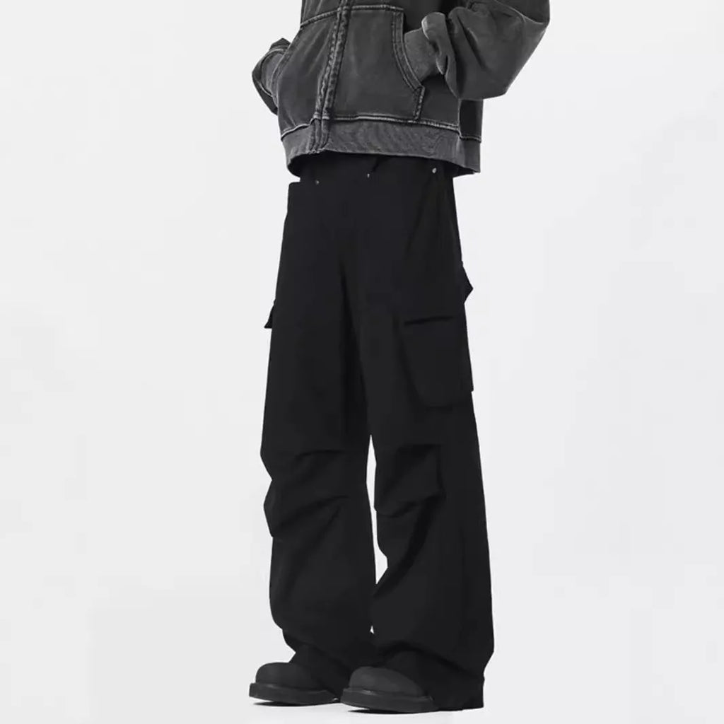 Men's beige straight-leg casual trousers with a high waist and button-fly front on a neutral background.