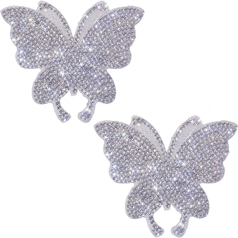 White diamond glass car sticker with bear claw and butterfly design, 7cm by 6cm.