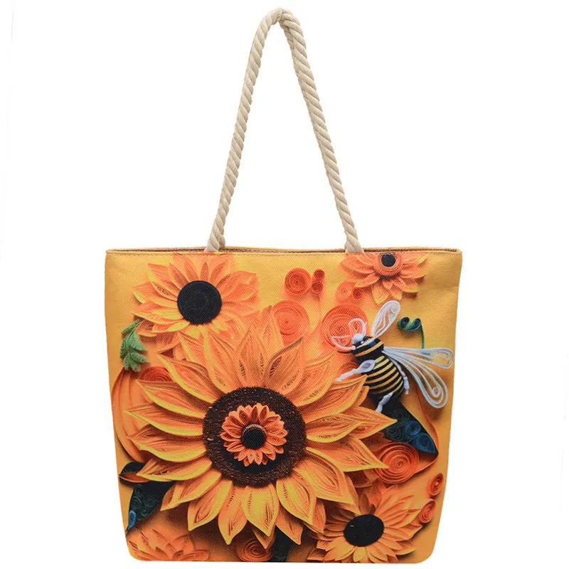 A soft cotton and linen string shoulder handbag with two straps and an open outer pocket.