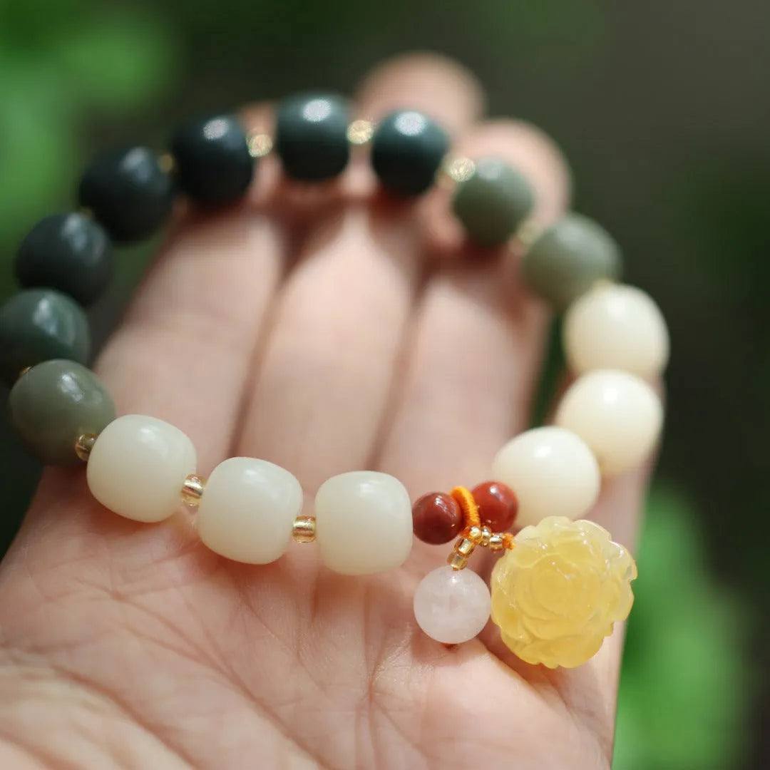 White jade gradient bodhi root bracelet with 10mm floral beads and beeswax lotus decorations