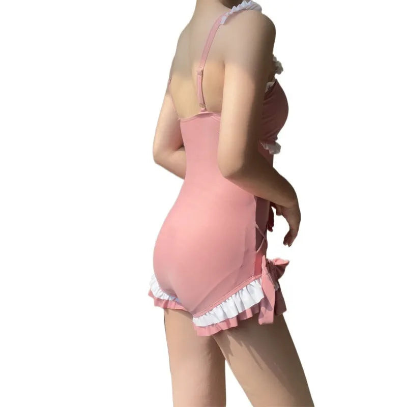 Women's one-piece sun protection swimsuit in milk silk fabric, solid pink colour, sleeveless style