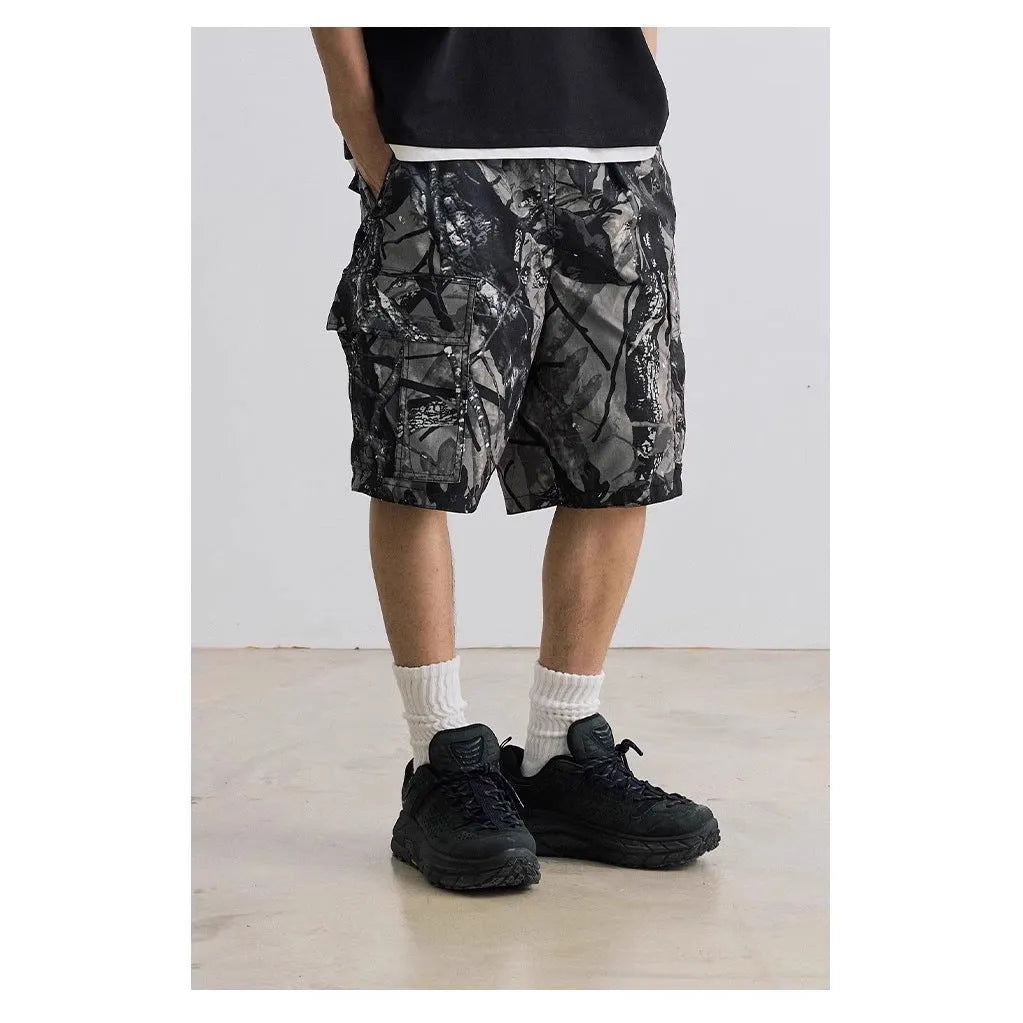 Men's loose fit denim shorts in army green with an elasticated waistband and straight leg.