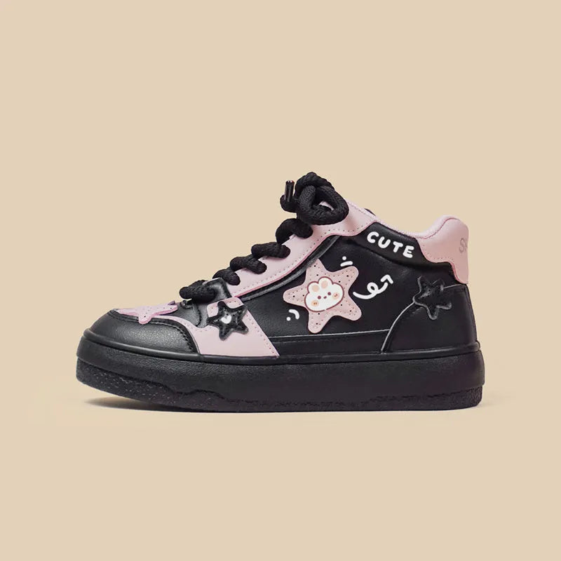 Women's black high top sneakers with cartoon anime pattern, colour blocking, cross straps, and lace-up closure