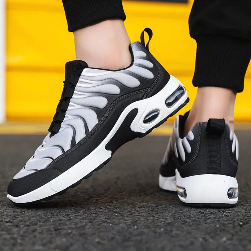 Colour-blocked lace-up sneakers for men with breathable fabric upper, rubber sole, and air cushion support in black and grey