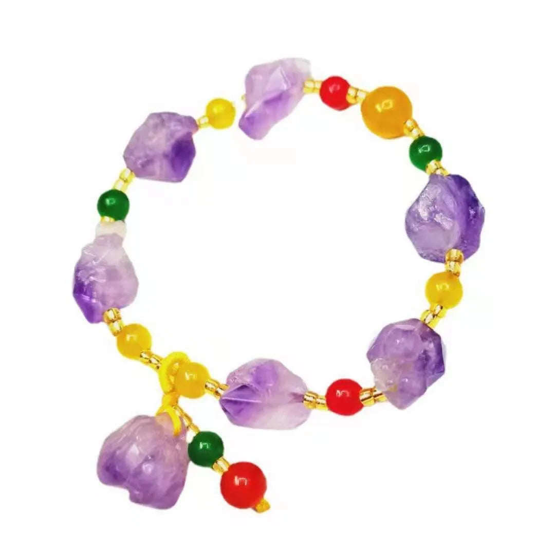 Women's natural amethyst bracelet with a fu character engraved on the central bead.