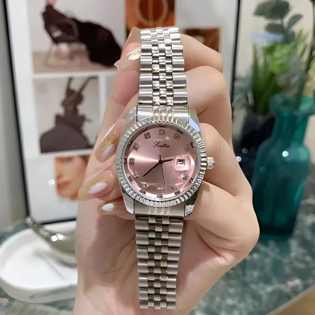 Women's casual quartz watch with solid steel belt, gold case, and white dial with calendar display