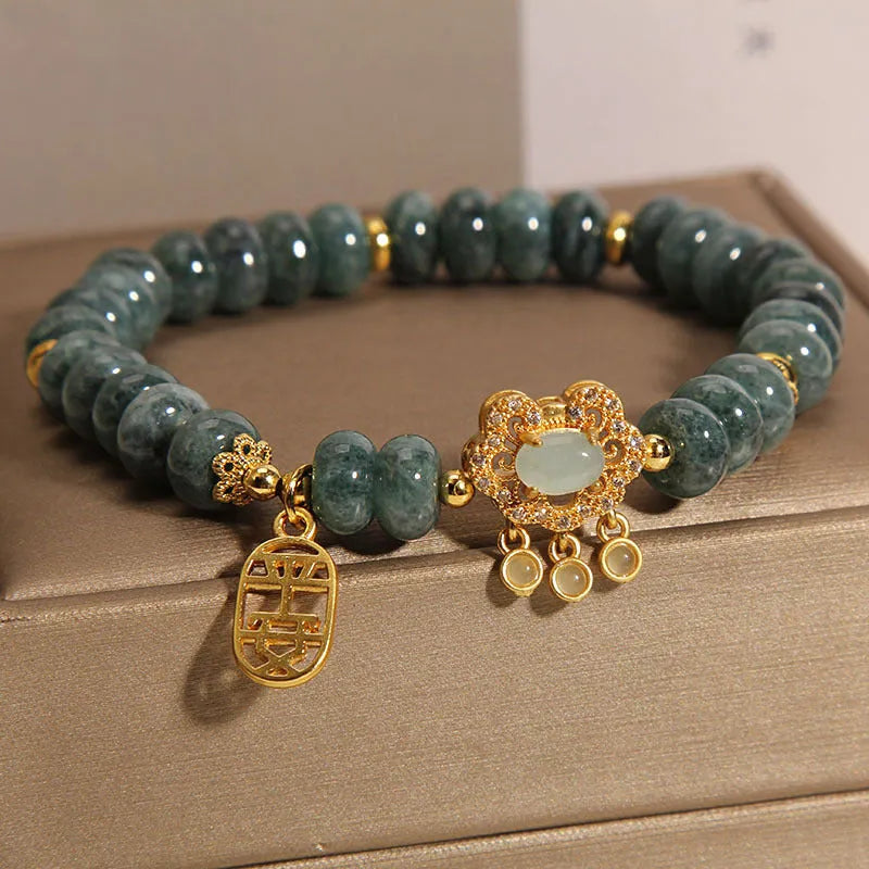 Women's natural emerald jade bracelet with abacus beads and safety lock closure