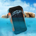 Black solar power bank with compass, LED flashlight, and 20000mAh capacity for mobile phone charging.