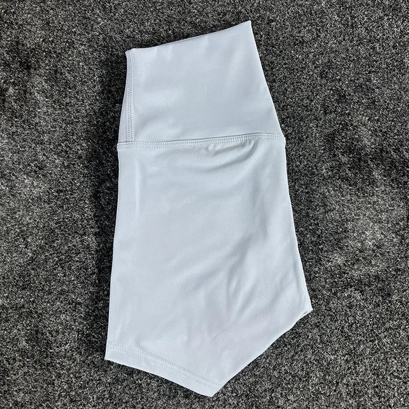 Women's high waist yoga shorts in nylon fabric for running and sports activities