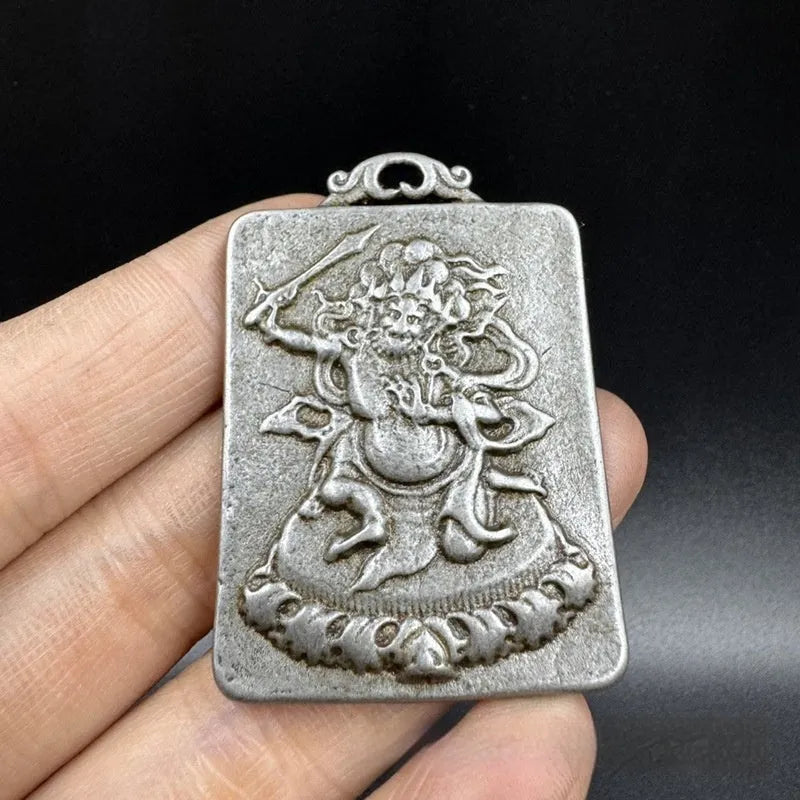 Antique Chinese style geometric iron pendant with Yamantaka Aryaacalanatha design.