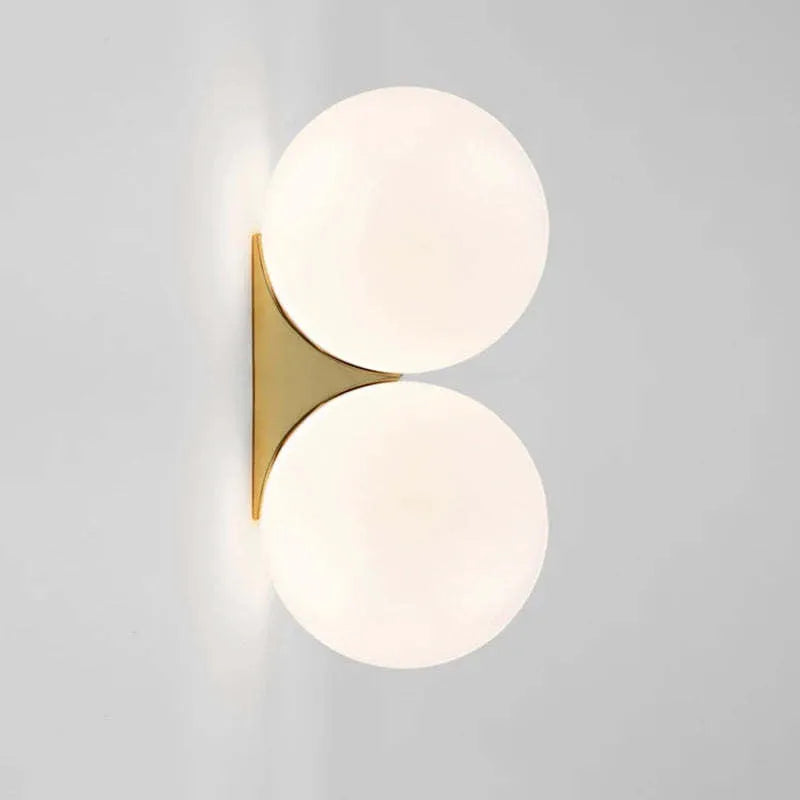 Simple glass ball wall lamp with gold finish and iron frame for bedroom bedside