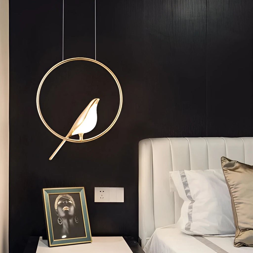 Modern linear chandelier with a minimalist metal magpie bird design and clear acrylic details, hanging 150cm long.