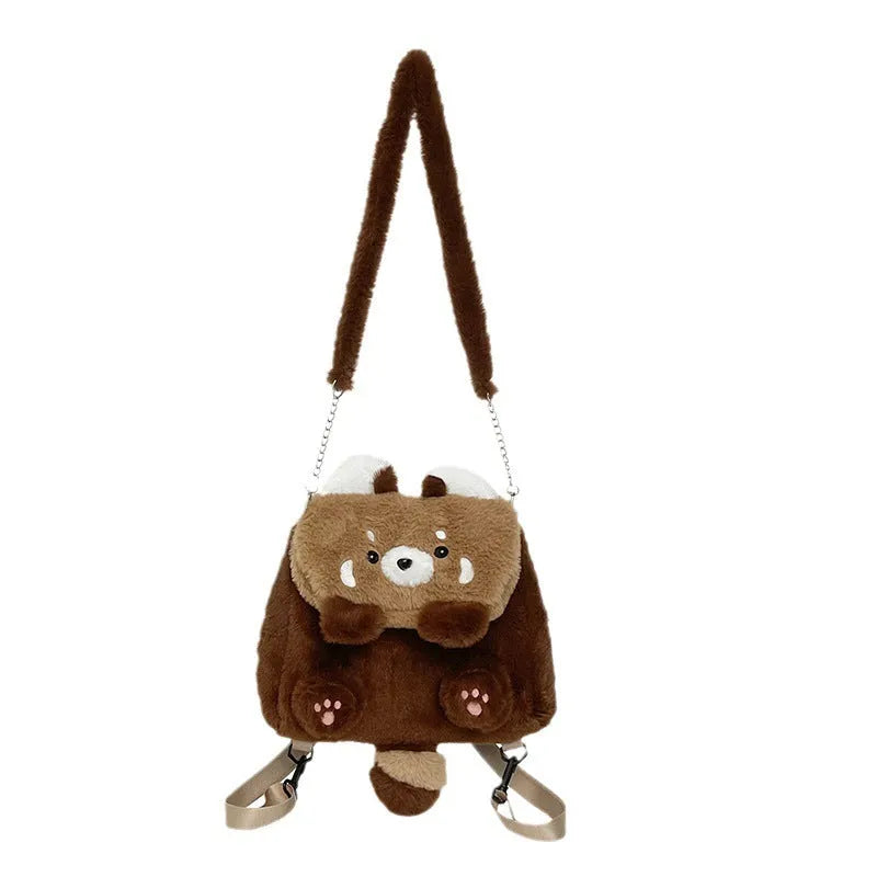 Brown coati plush bag doll cartoon backpack on display showing soft fabric and animal face design