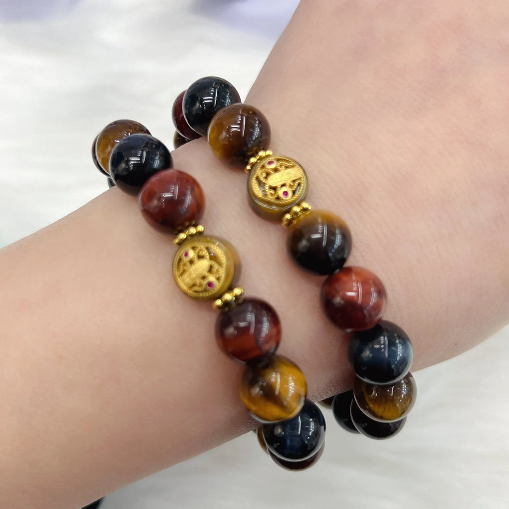 Natural colour tiger eye stone bead bracelet with maillard chain showing 18cm adjustable length