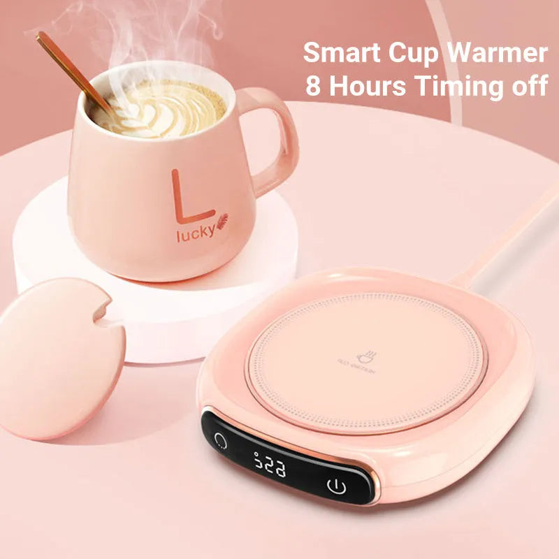 White USB-powered coffee mug warmer coaster on a wooden desk
