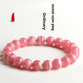 Women's geometric design crystal bracelet with natural red rhodochrosite stones and longevity lock fastening