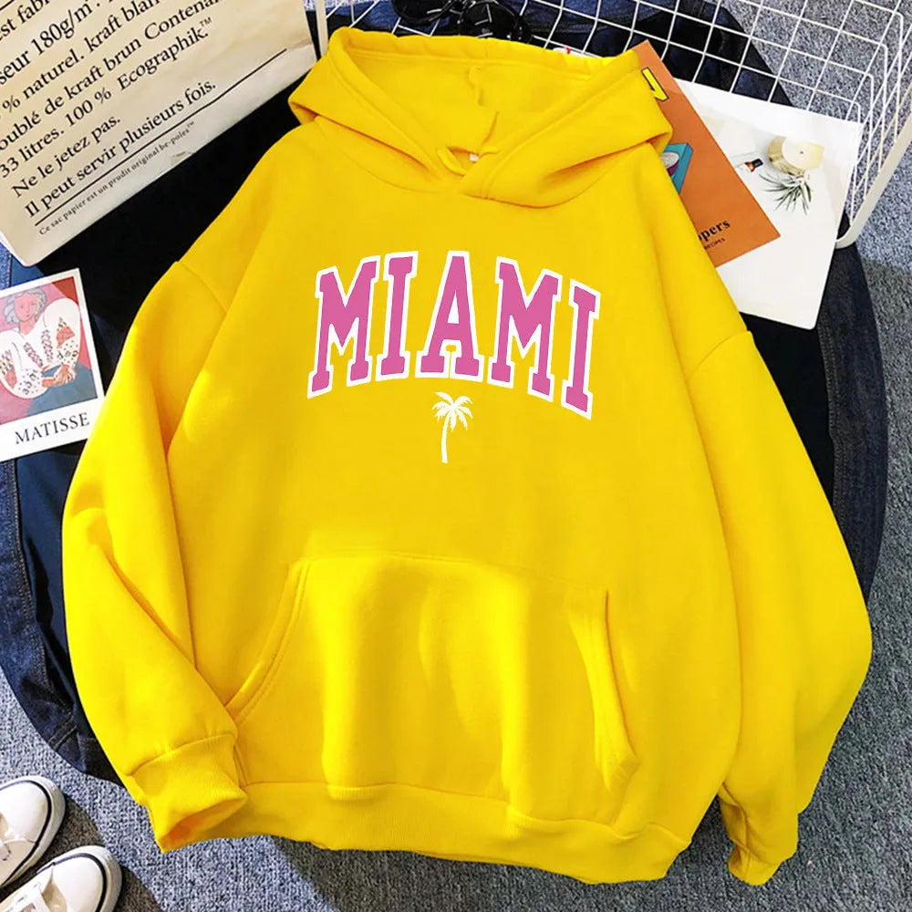 Women's loose pullover hoodie in polyester, shown in multiple colours including white, black, red and blue, sizes XS to XXXL