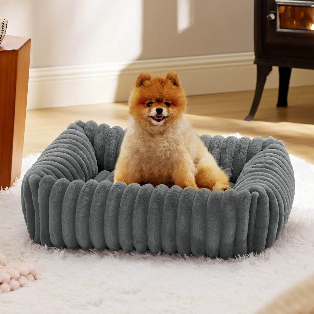 Raised-edge pet dog cat bed cushion in beige, shown in a large size with high sides.