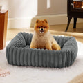 Raised-edge pet dog cat bed cushion in beige, shown in a large size with high sides.