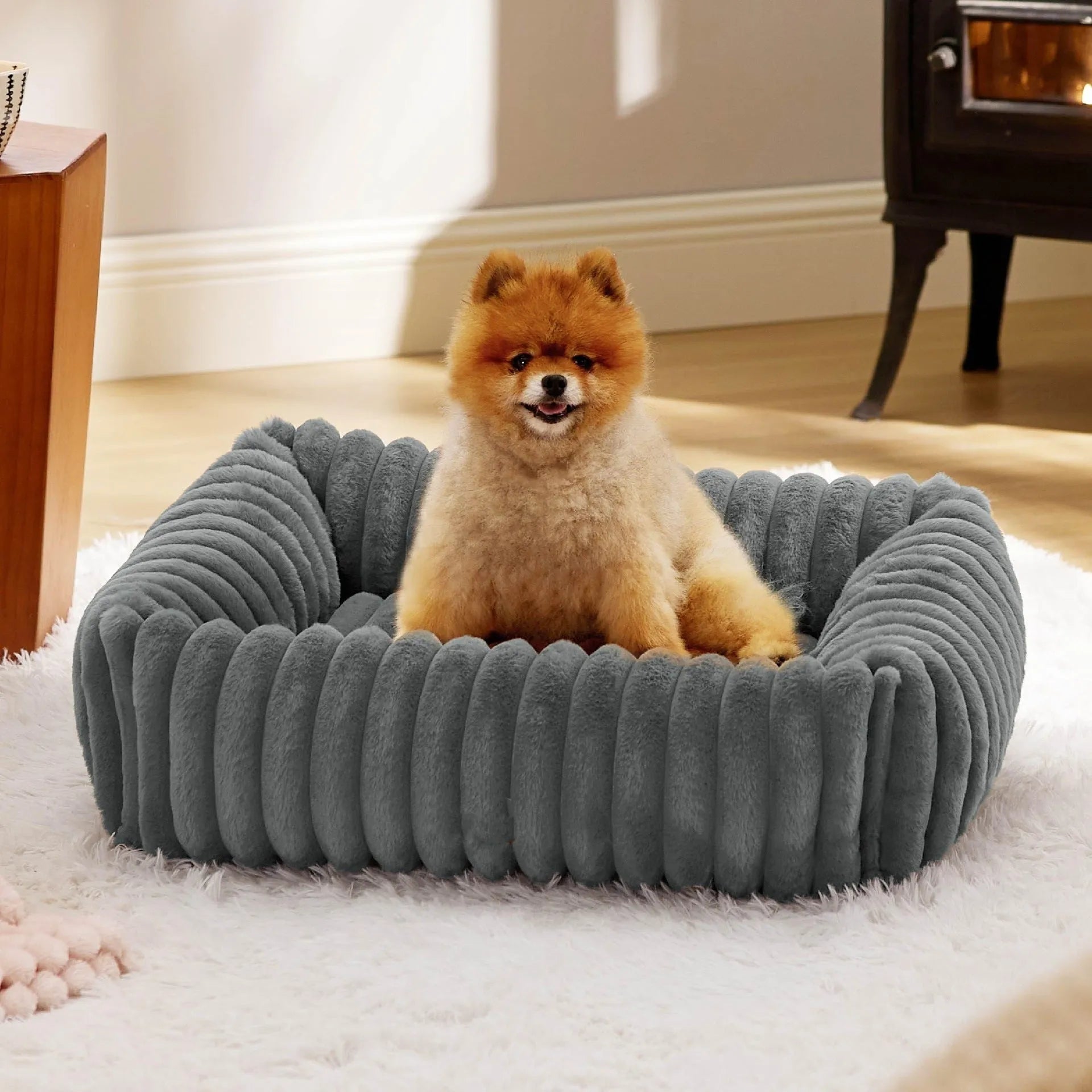 Raised-edge pet dog cat bed cushion in beige, shown in a large size with high sides.