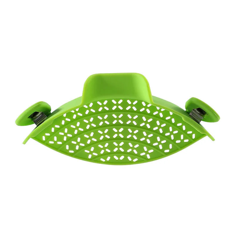Silicone and stainless steel pot drain stopper kitchen gadget in assorted colours.