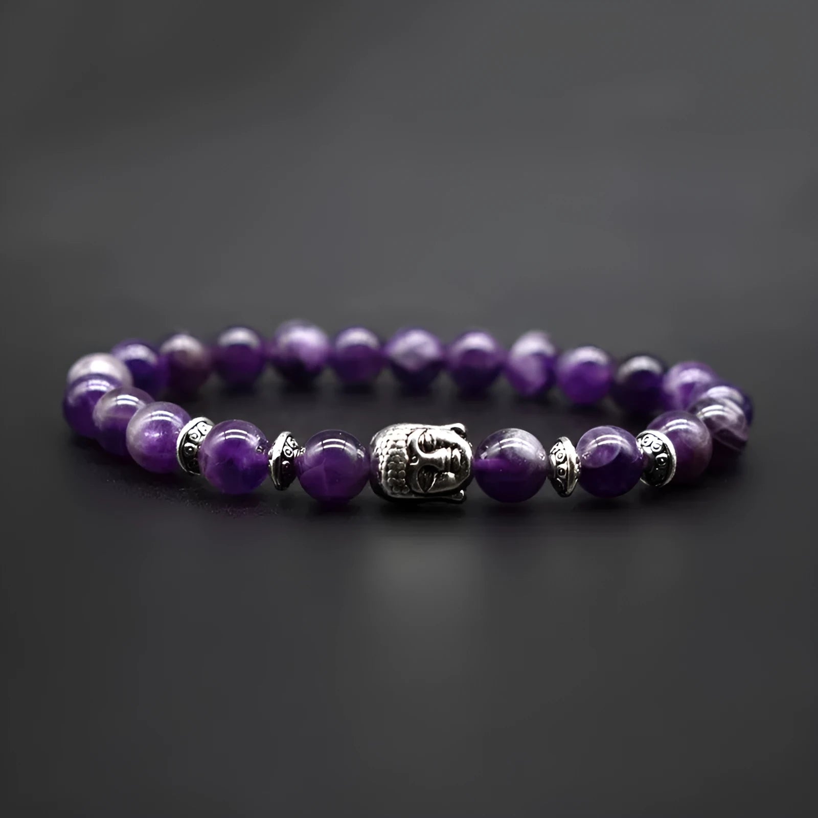Unisex tiger eye bracelet with Buddha head charm in choice of five materials, 19mm size.