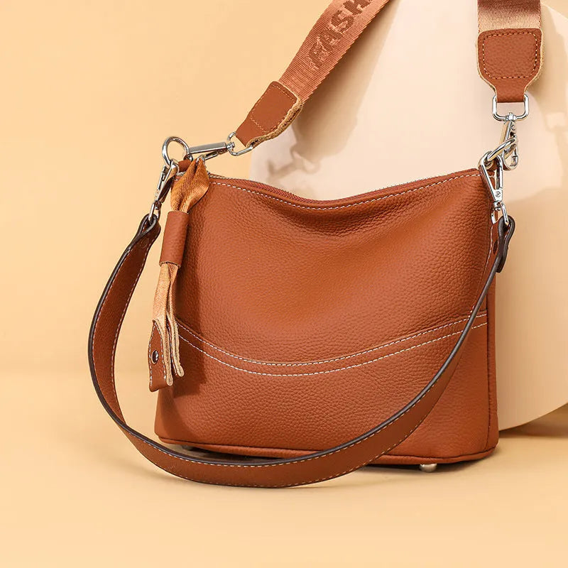 Genuine leather horizontal square crossbody bag with inner patch pocket, available in black, brown and khaki