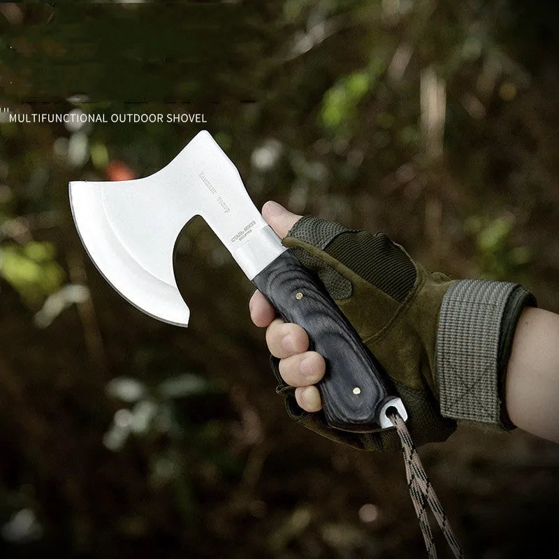 Outdoor Tactics stainless steel axe on ground, 57cm length, 49HRC hardness for wood chopping