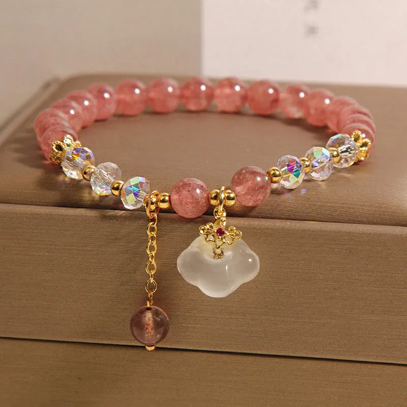 Women's natural crystal bracelet with strawberry quartz and white agate beads, auspicious cloud accents, 40g, on white background